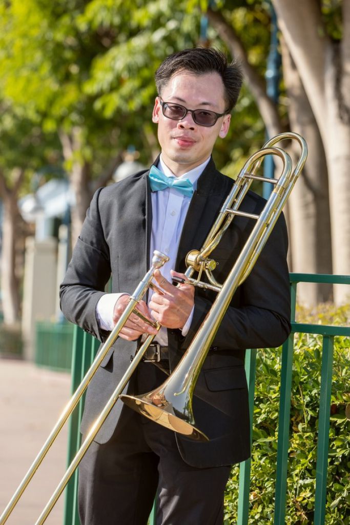 長號樂手張子浩自小患有大腦痙攣，平日要用柺杖代報，但仍長年堅持學習樂器。