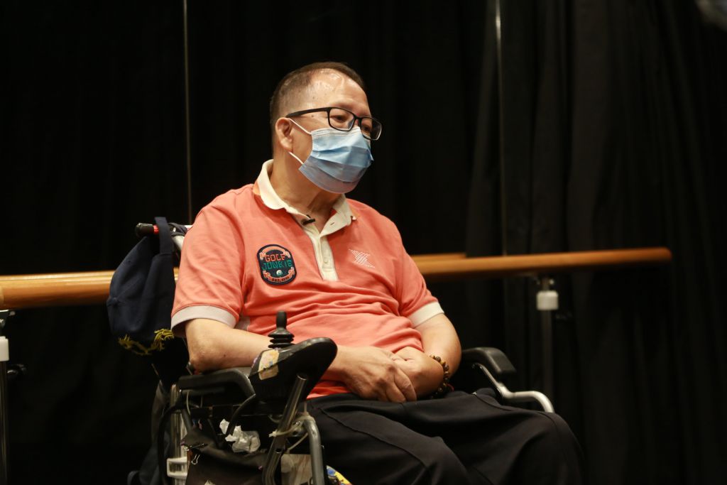 69歲的阿Joy，在50歲時因中風而成為輪椅人士。
